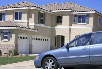 Suburban home with car in driveway
