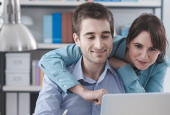 Young Couple shopping for insurance online