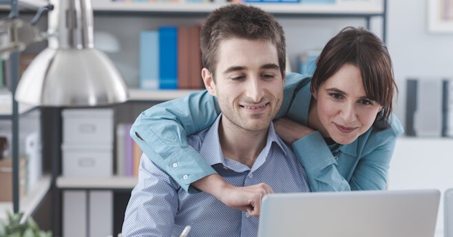 Young Couple shopping for insurance online